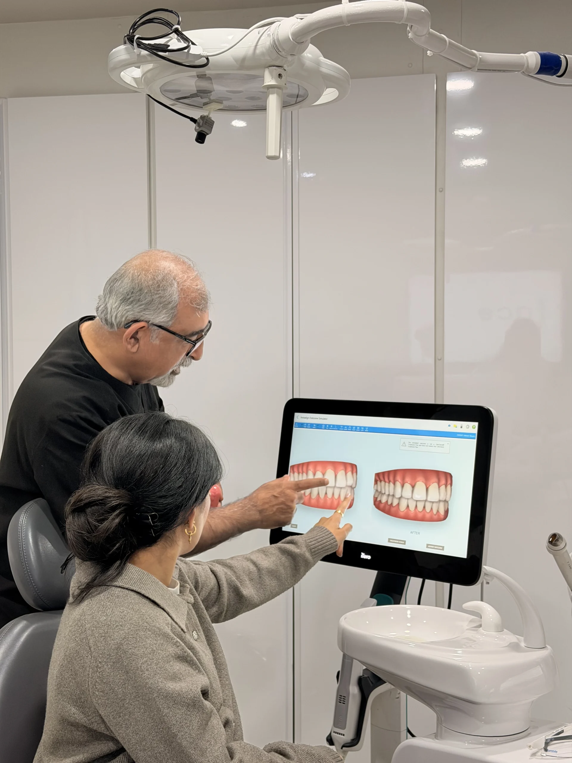 Dr Osman with patient scan